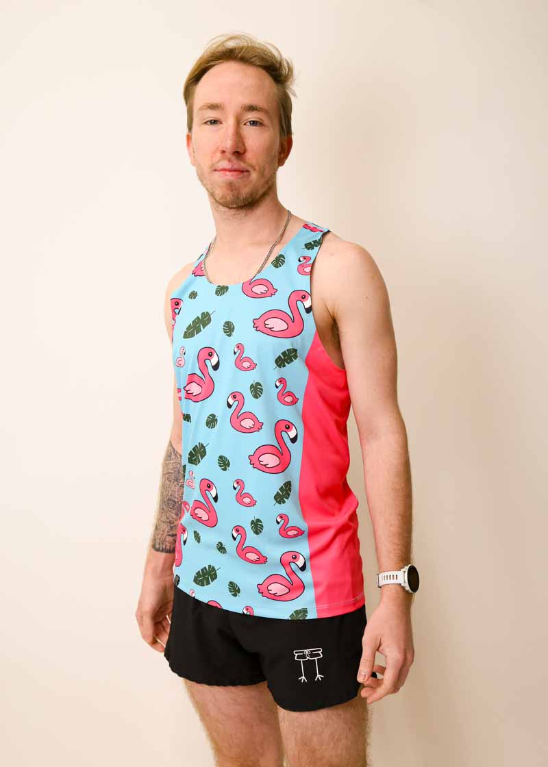 Side view of the ChicknLegs men's blue flamingo performance singlet.