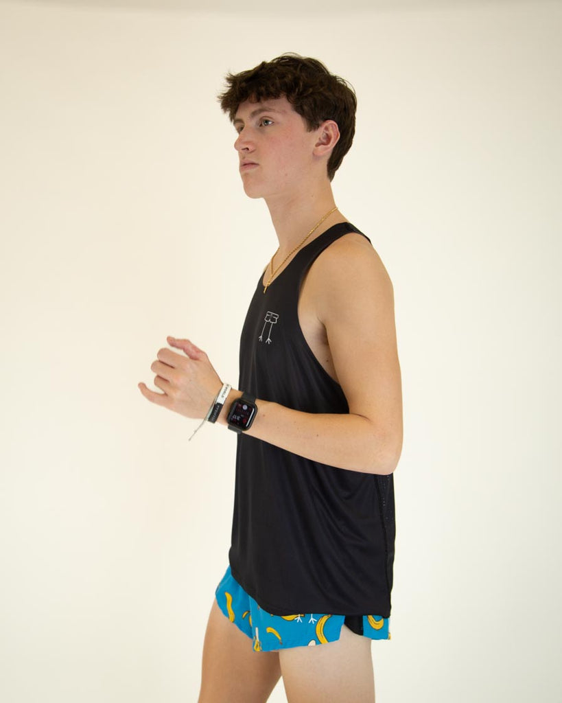 Left side view of ChicknLegs Performance Running Singlet highlighting the smooth, chafe-free seams and lightweight material for optimal movement.