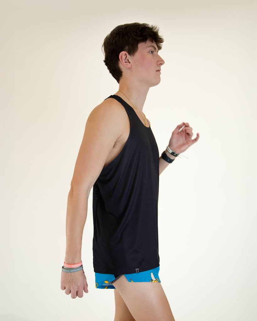 Right side view of ChicknLegs Performance Running Singlet featuring the breathable, quick-dry fabric and seamless arm opening for a smooth fit.
