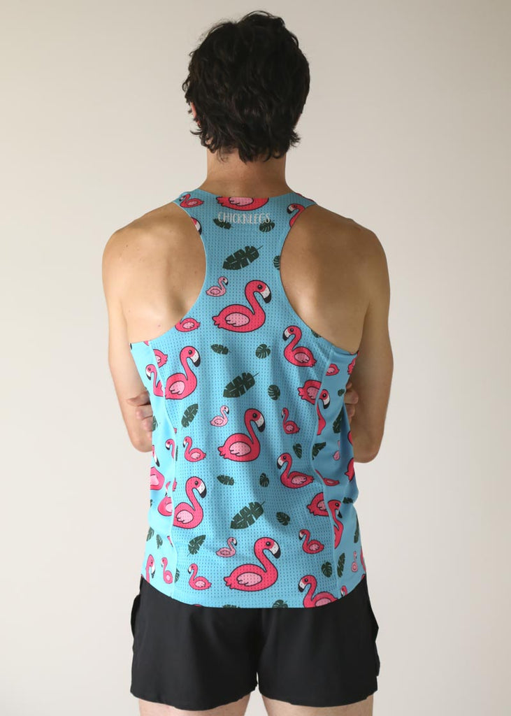 Model wearing chicknlegs men's performance singlet wearing blue flamingo design back view.