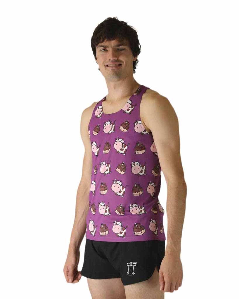 Runner is wearing ChicknLegs in the men's performance singlet that is lightweight and has the choccy cow design. The print has chocolate milk and brown cows on a purple background.