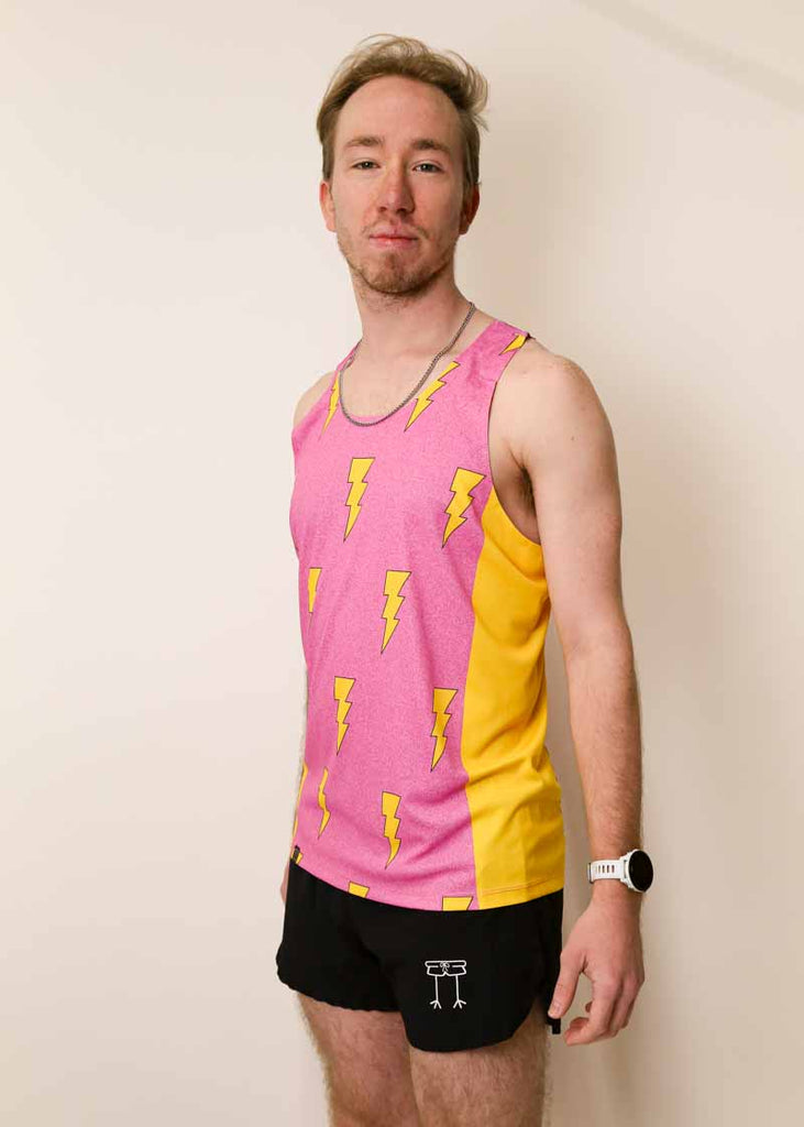 Side view of the ChicknLegs performance running singlet in our pink lightning bolts design.