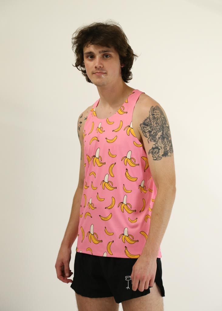 Side view of the men's pink bananas performance running singlet from ChicknLegs.