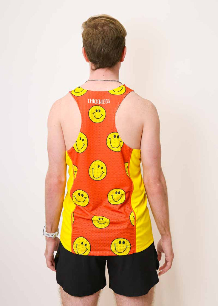 Back view of the men's performance running singlet from ChicknLegs in a smiley face design.