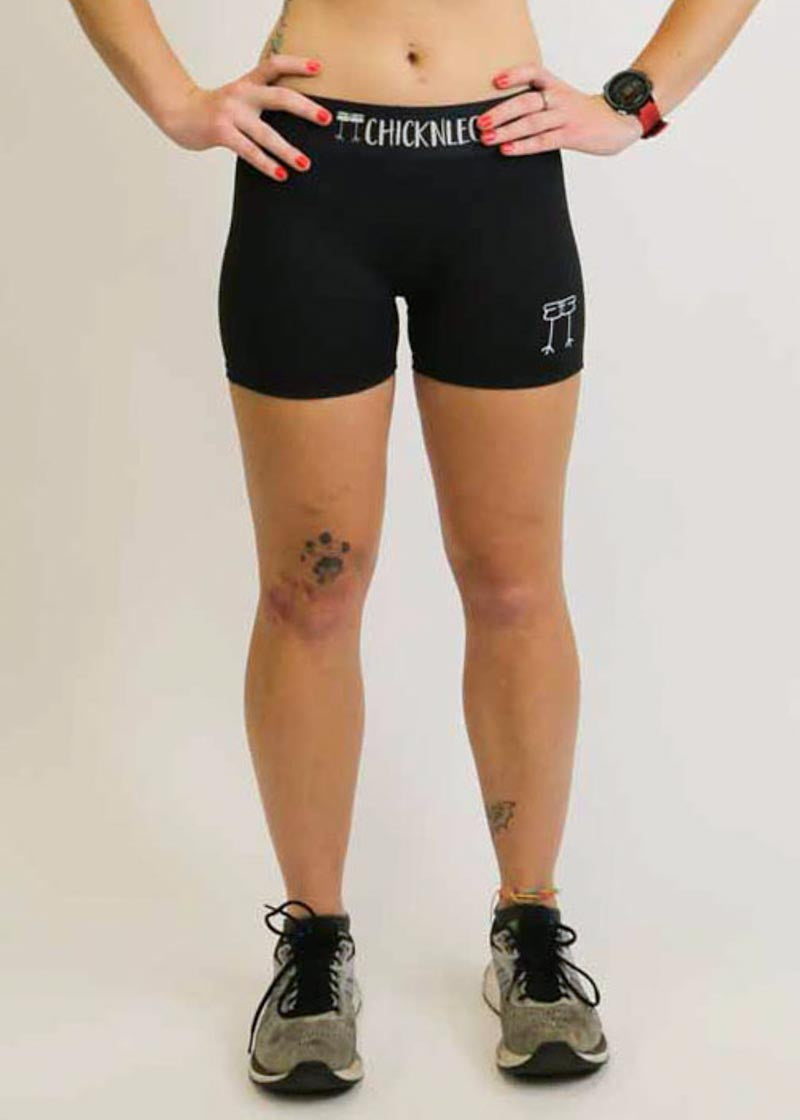 Front closeup view of the women's black 3 inch compression shorts.