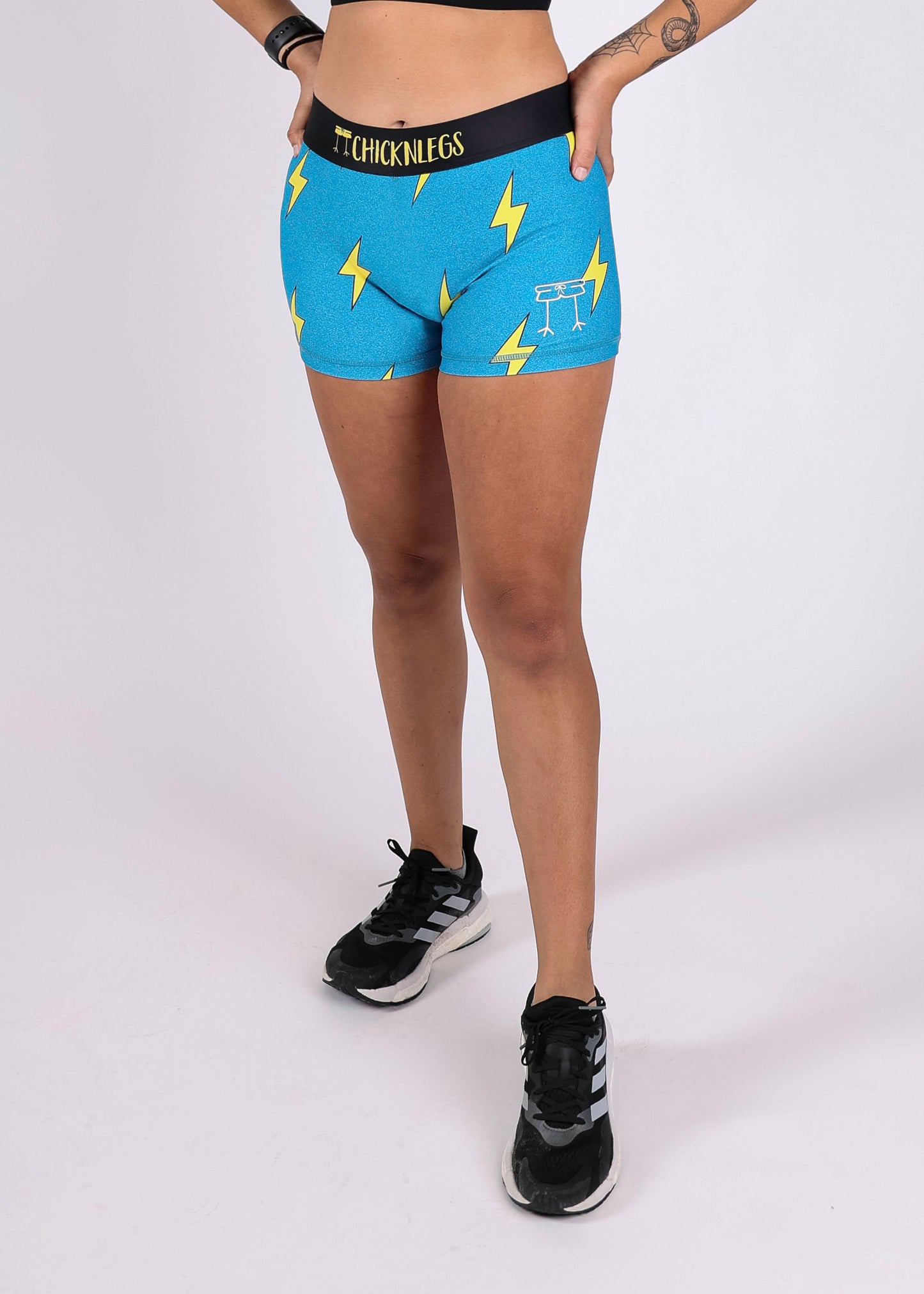 Front closeup view of the women's blue bolts 3 inch compression running shorts.