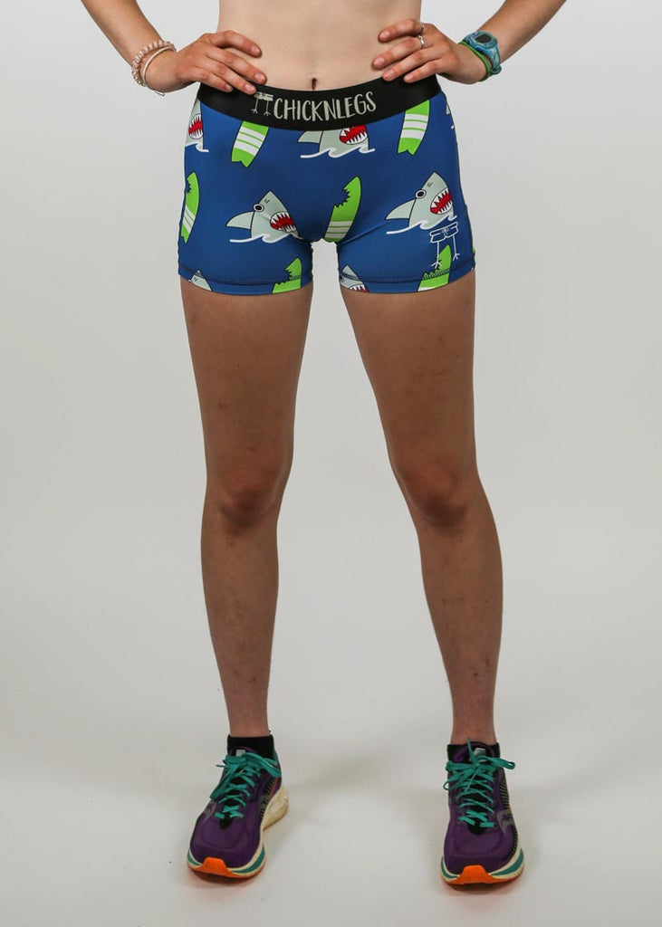 Closeup front view of the women's 3 inch blue sharks compression running shorts.