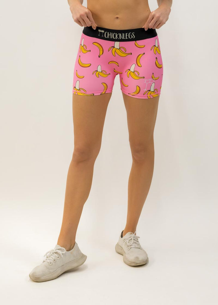 Front view of the women's pink bananas compression running shorts from ChicknLegs.