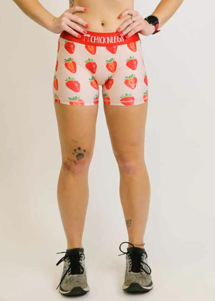 Front view of the women's 3 inch strawberry compression running shorts from ChicknLegs.