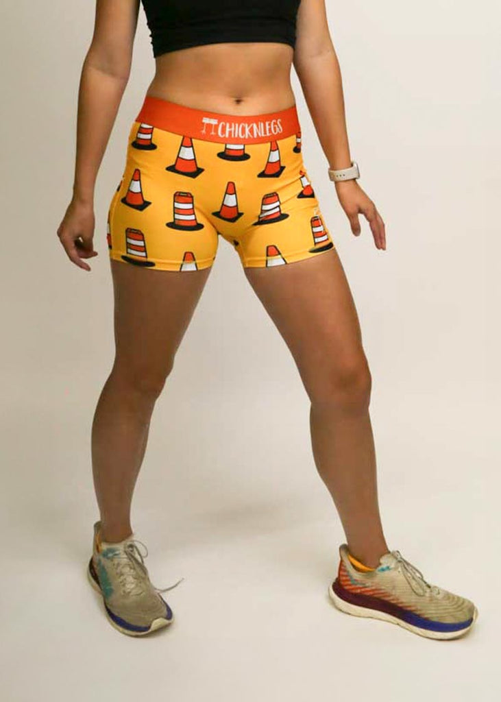Front view of the women's 3 inch traffic cones compression running shorts.