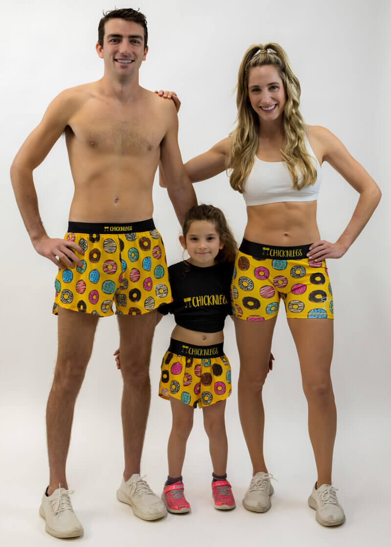 Group shot of runners wearing the salty donuts running shorts.