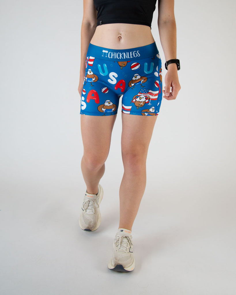 Runner is wearing ChicknLegs in the women's 3 in compression spandex shorts with side pockets. Great for long runs, hiking, working out, weight lifting, track and field and more. USA Pool Party is here for 4th of July that has eagles and red white and blue all over.
