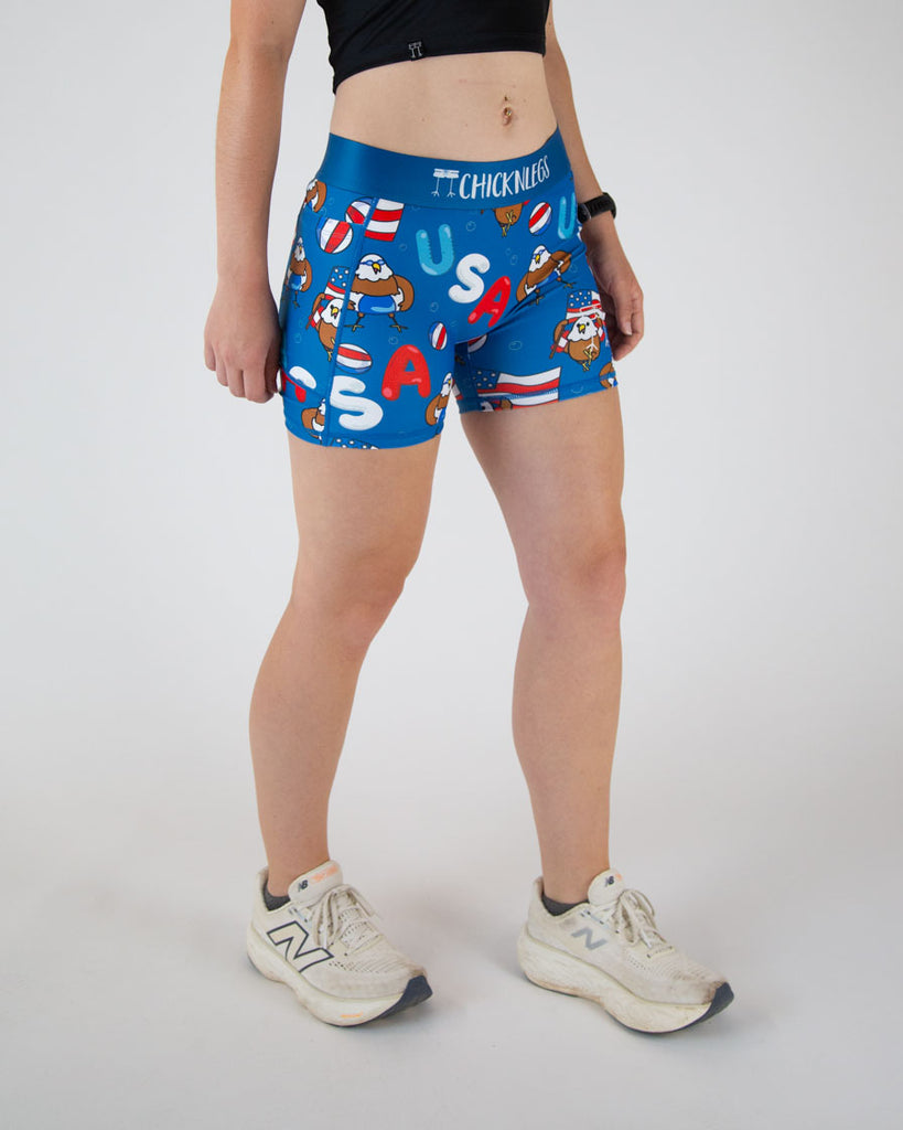 Runner is wearing ChicknLegs in the women's 3 in compression spandex shorts with side pockets. Great for long runs, hiking, working out, weight lifting, track and field and more. USA Pool Party is here for 4th of July that has eagles and red white and blue all over.