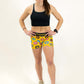 Full body shot of the women's 3 inch donut compression running shorts from ChicknLegs.