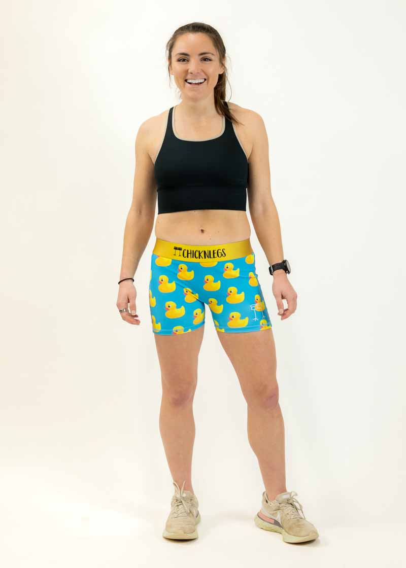 Runner smiling in the 3" rubber ducky compression running shorts from ChicknLegs.