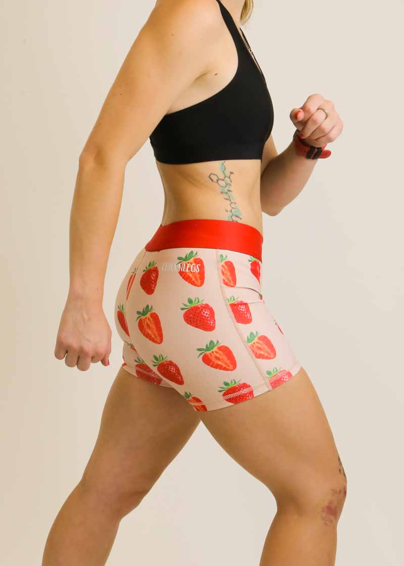 Right side view of the women's 3 inch strawberry compression running shorts from ChicknLegs.