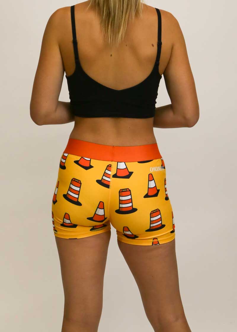 Back view of the orange traffic cone compression shorts from ChicknLegs.