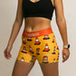 Side view of women's traffic cone compression running shorts from ChicknLegs.