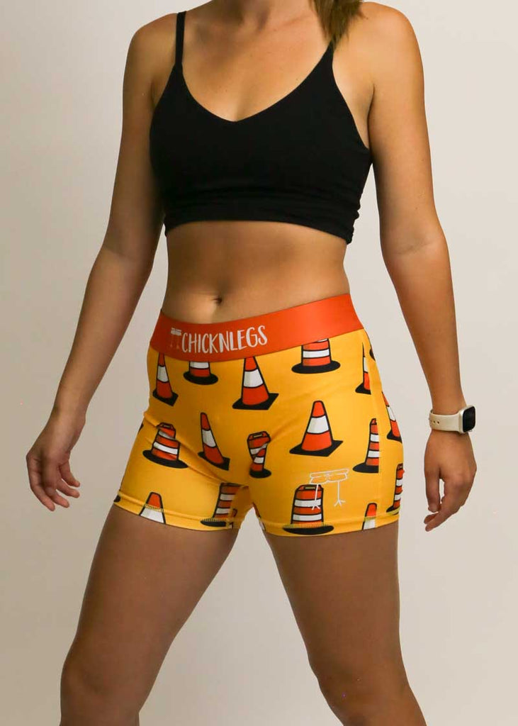 Side view of women's traffic cone compression running shorts from ChicknLegs.