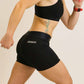 Side view of runner wearing 3 inch black compression shorts from ChicknLegs.