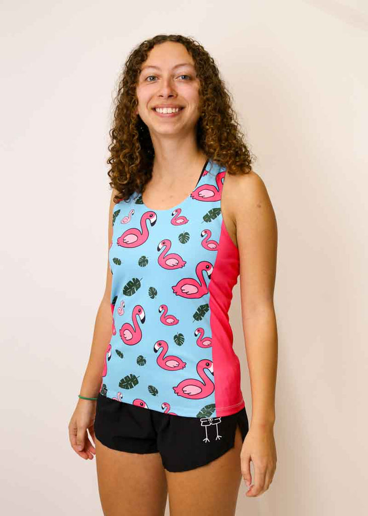 Side view of the women's blue flamingo performance singlet.