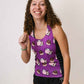 Runner wearing ChicknLegs split shorts and choccy cows performance running singlet.