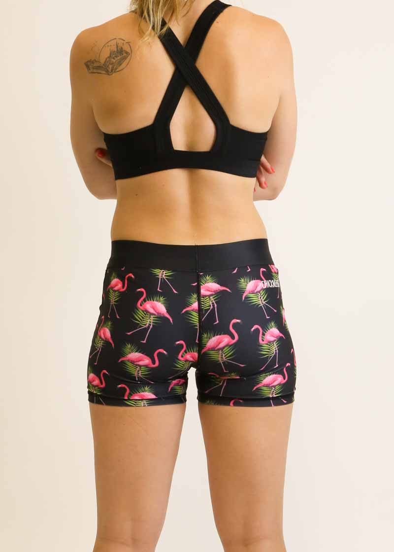 Back view of runner wearing the flamingo compression shorts from ChicknLegs.