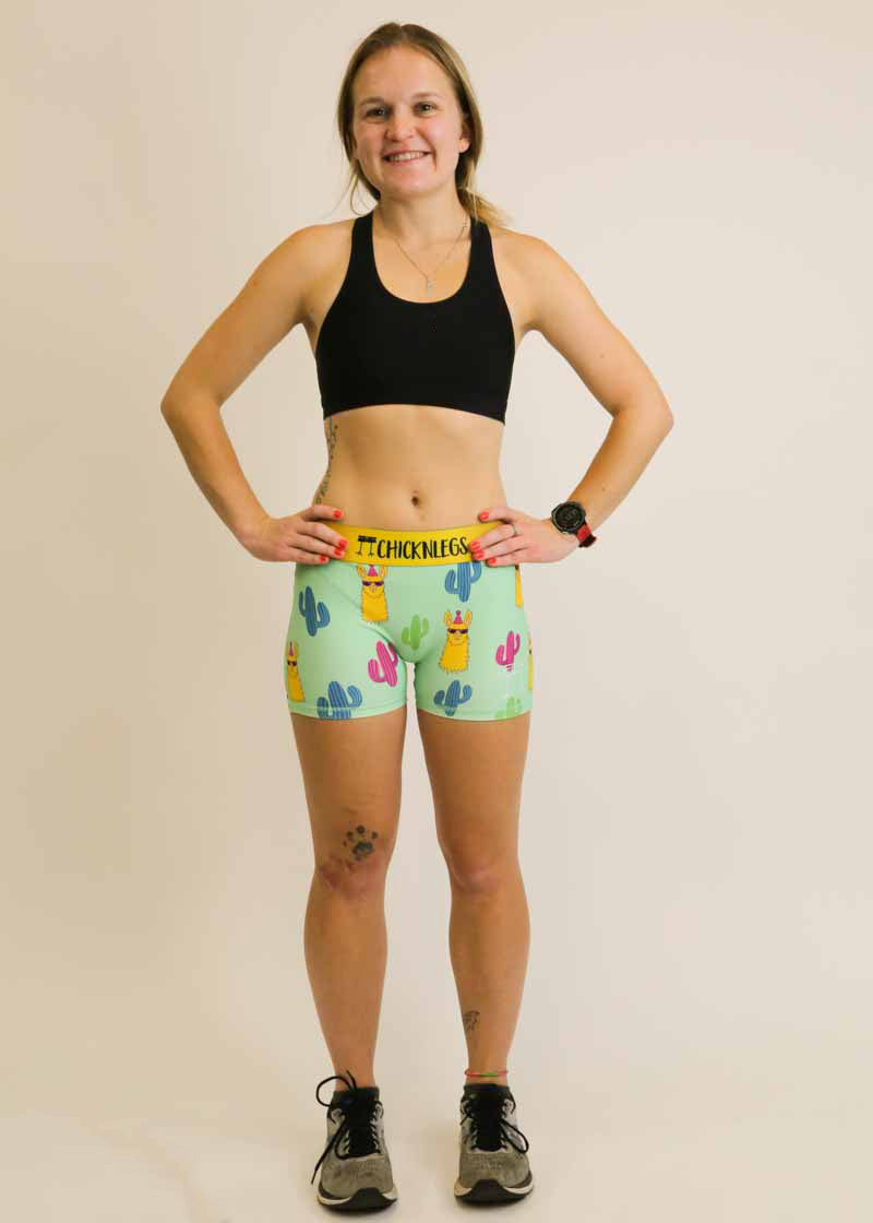 Full body view of the women's green llamas 3 inch compression shorts from ChicknLegs.