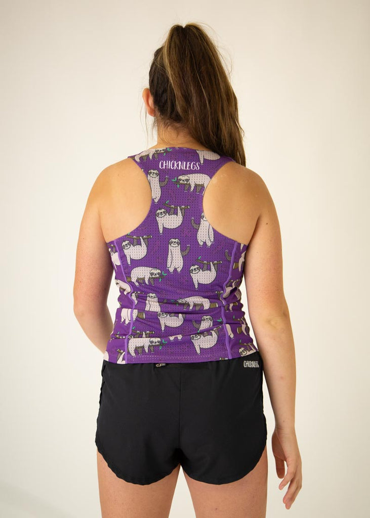 The model is a runner who is wearing Chicknlegs women's singlet in the sloths design, facing away from the camera to show the back of the singlet.