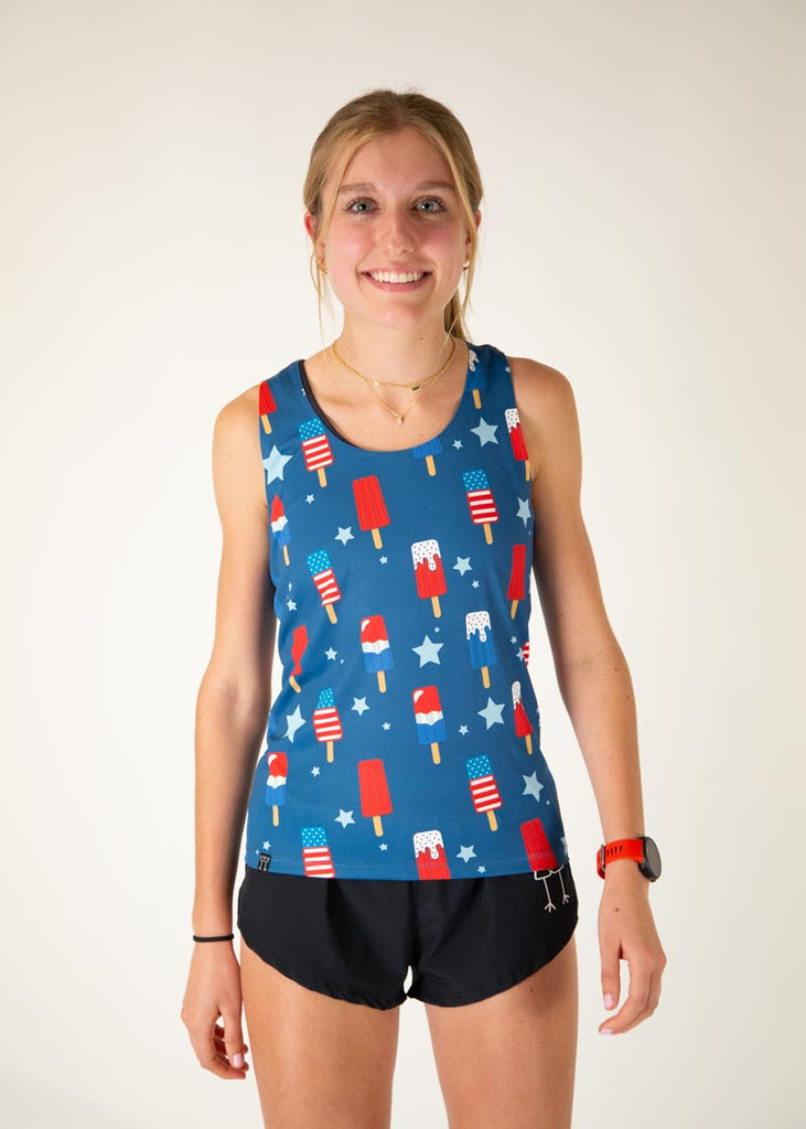 Runner is wearing ChicknLegs in the women's performance singlet in the USA Popsicle singlet. The print has ice cream all over it in red white and blue.