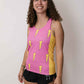 Side view of the women's pink bolts performance running singlet.