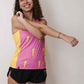 Runner stretching while wearing the women's pink bolts performance singlet.