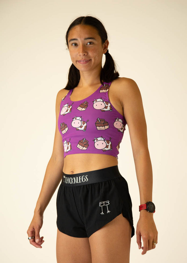Side view of the women's choccy cows PWR Crop Top.