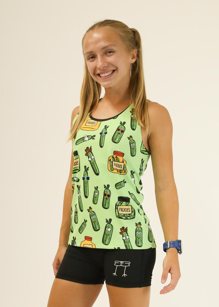 Model is wearing Chicknlegs women's singlet in the pickles design facing left for side view.
