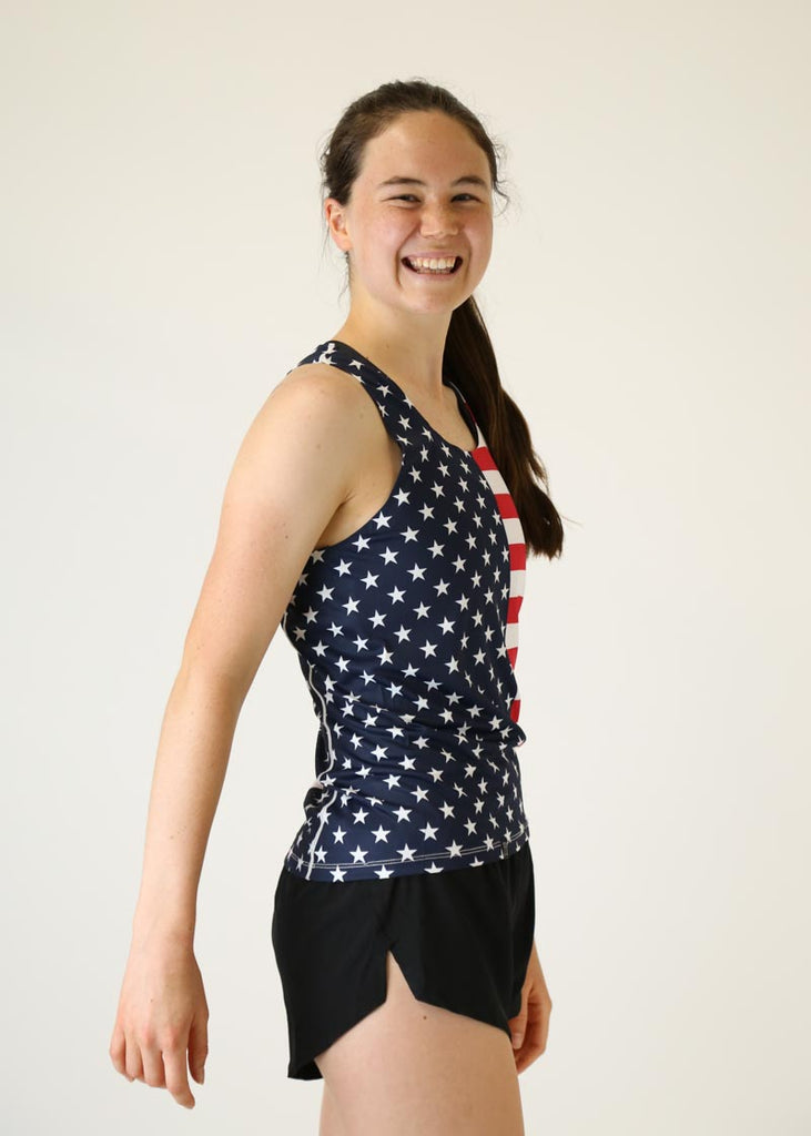 Side view of the women's USA perfomance running singlet.