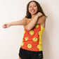 Runner stretching while wearing the smileys running singlet from ChicknLegs.