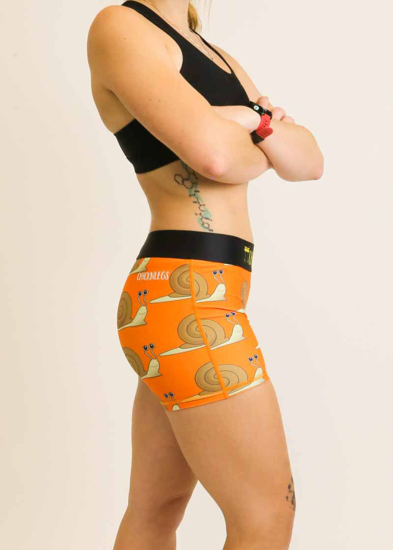 Right side view of the women's 3 inch compression shorts with a snail design.
