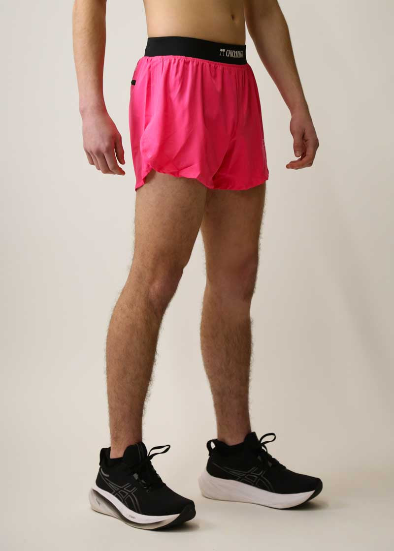 Side view of the neon pink half split running shorts from ChicknLegs.