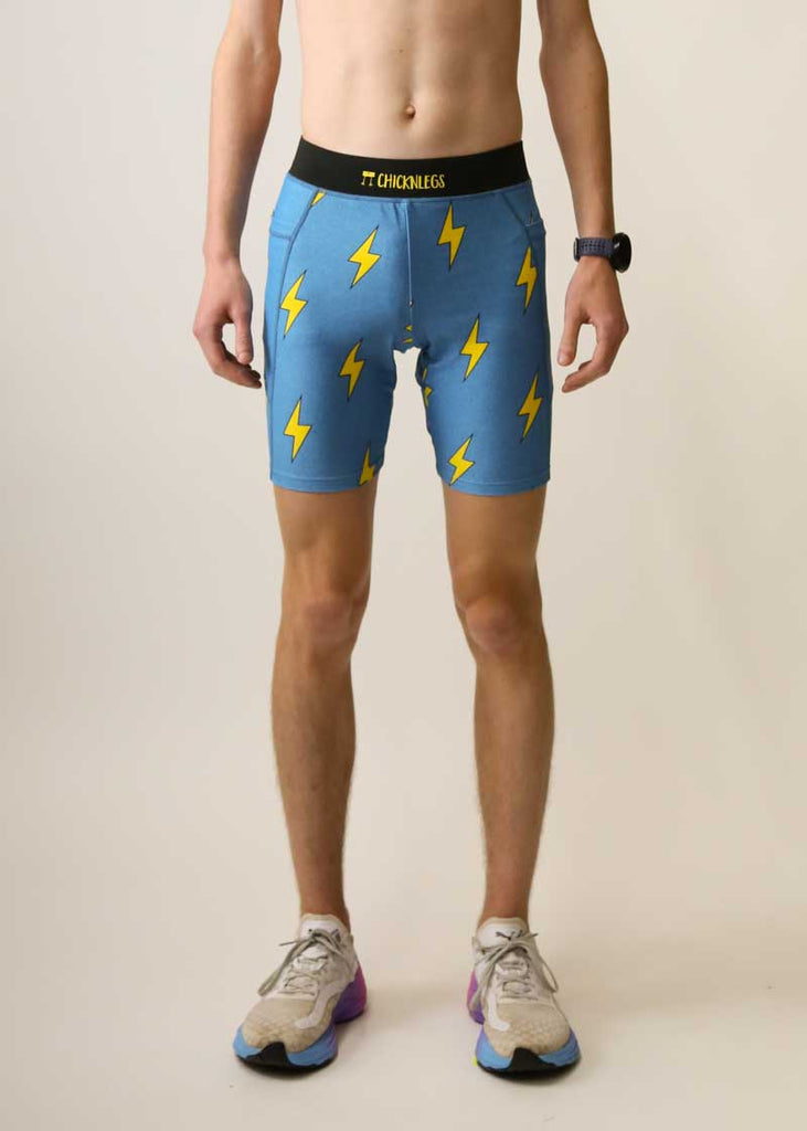 Front view of the men's 8 inch blue bolts half tights.