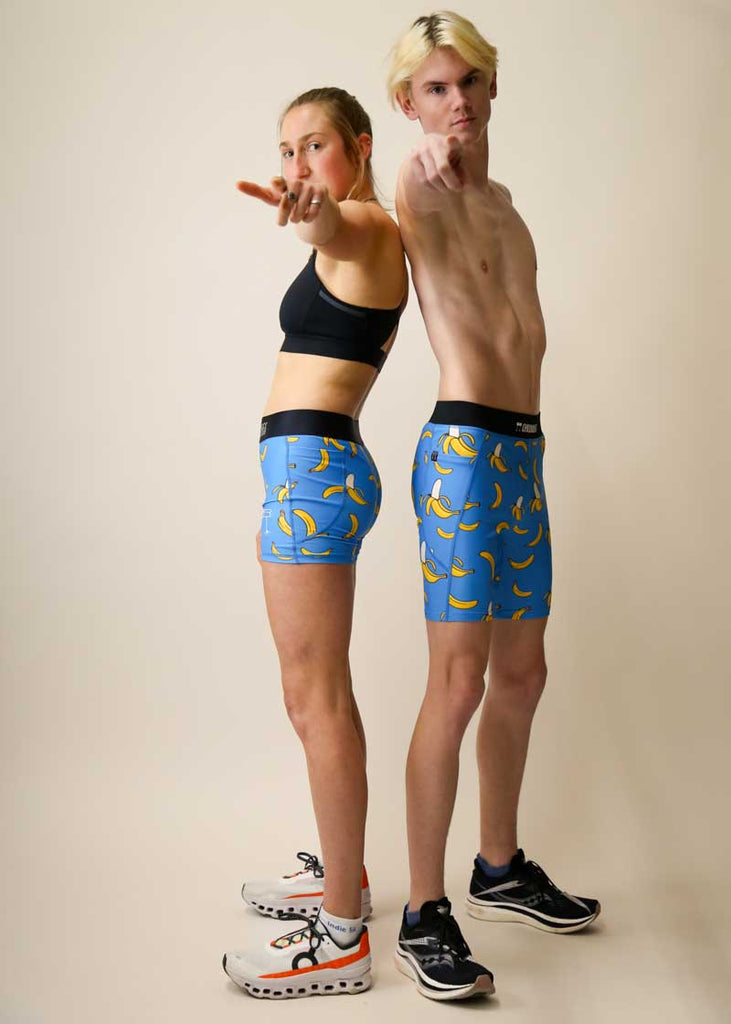 Runners wearing the men's and women's blue bananas compression shorts by ChicknLegs.