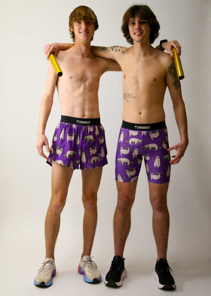 Runners wearing the sloth running shorts and half tights while holding relay batons.