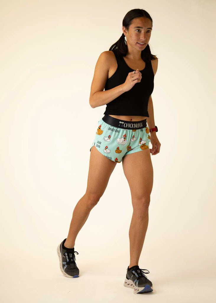 Full body view of the women's swaggy chickens  1.5 inch split running shorts.