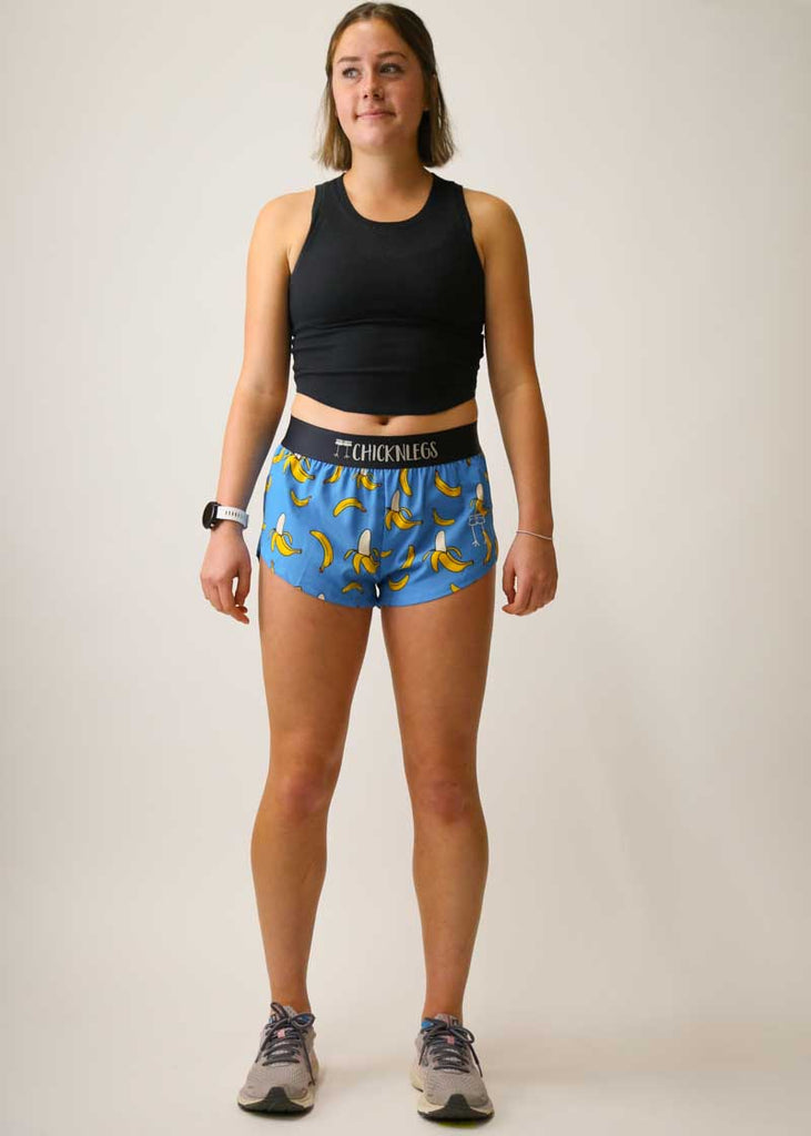 Full view of runner wearing the blue bananas split running shorts from ChicknLegs.
