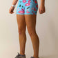 Closeup side view of the women's 3 inch blue flamingo compression shorts.