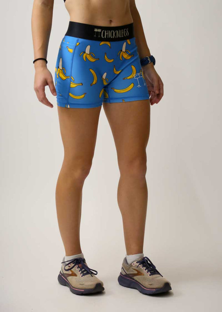 Side view of the women's 3 inch compression spandex shorts with our blue bananas design.