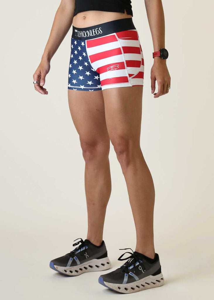 Left side view of the women's 3 inch USA compression running shorts from ChicknLegs.