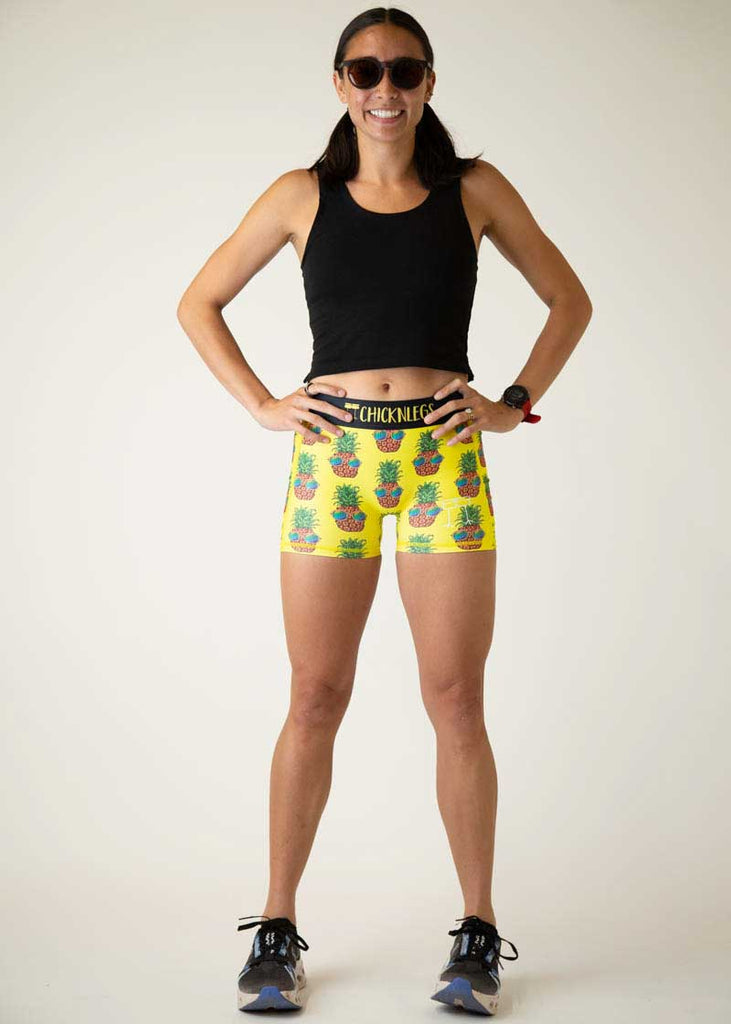 Full body view of the women's 3 inch pineapple express compression running shorts from ChicknLegs.