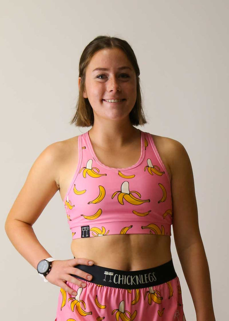 Front view of the pink bananas OG running sports bra from ChicknLegs.