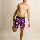 Runner stretching while wearing the men's 8 inch choccy cows compression half tights.