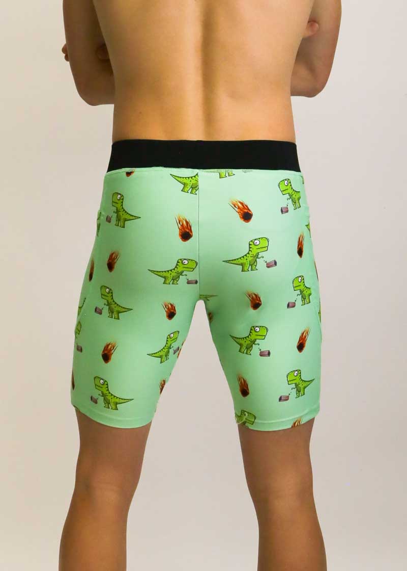 Back view of the men's 8 inch half tights with a dinosaur design.